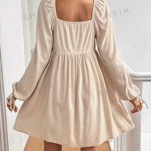 Woman’s tan square neck dress